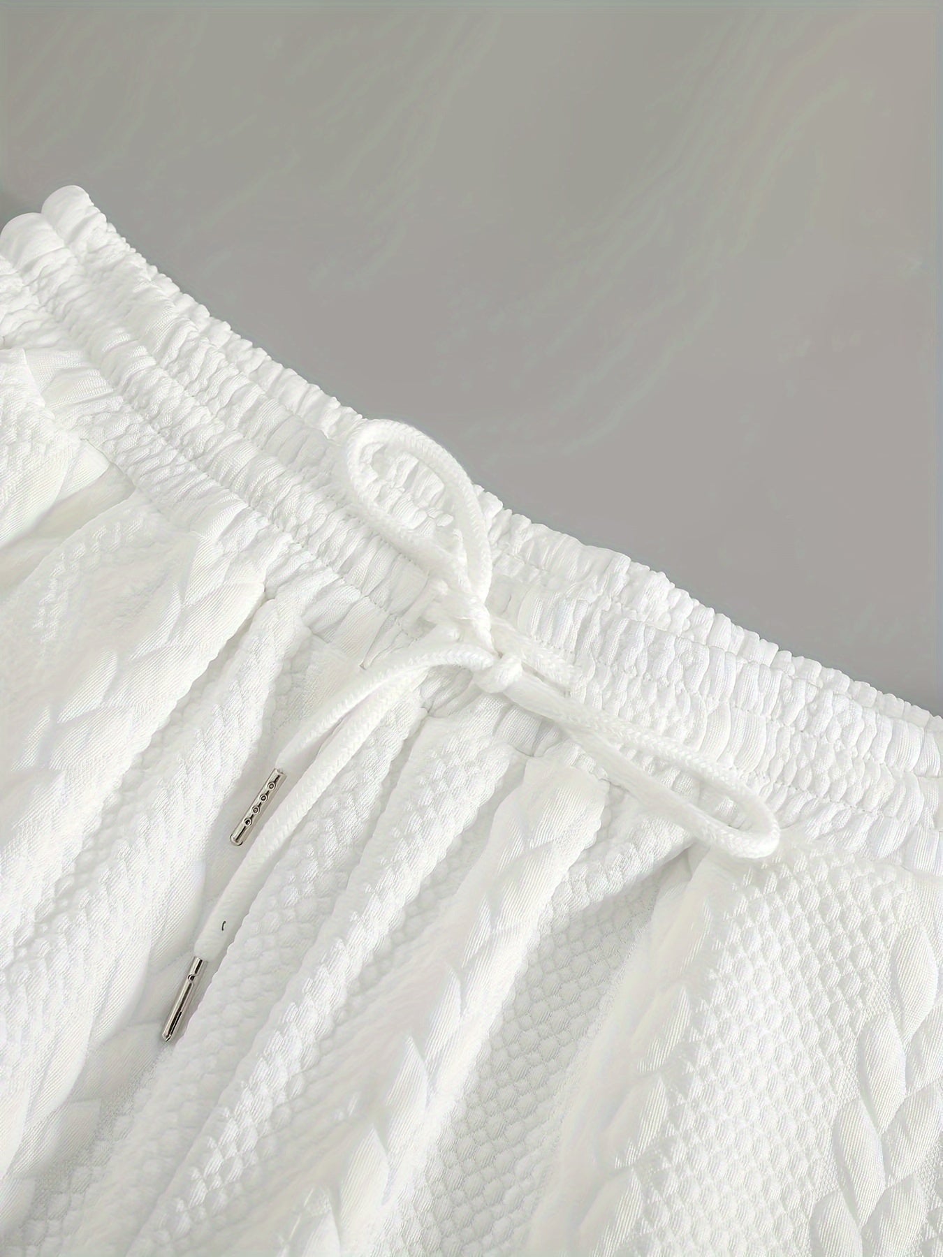 Conjunto de camiseta y pantalón corto de punto trenzado texturizado